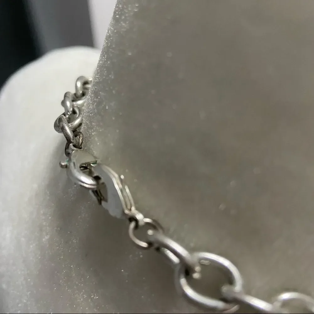 Long link silver and gold tone adjustable necklace with faceted yellow jewels